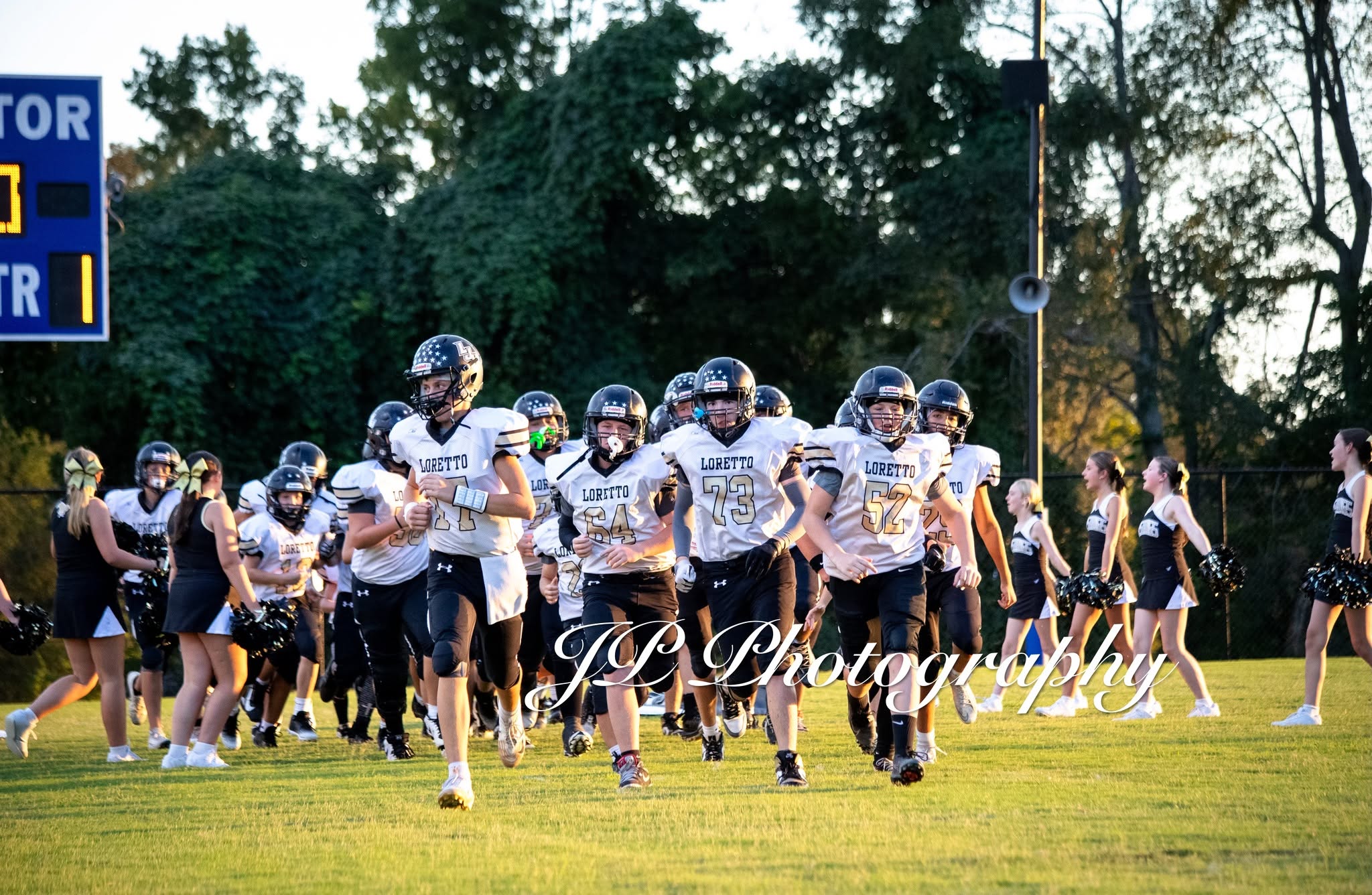 Members of the Junior High Mustangs take the field prior to their game vs. Summertown