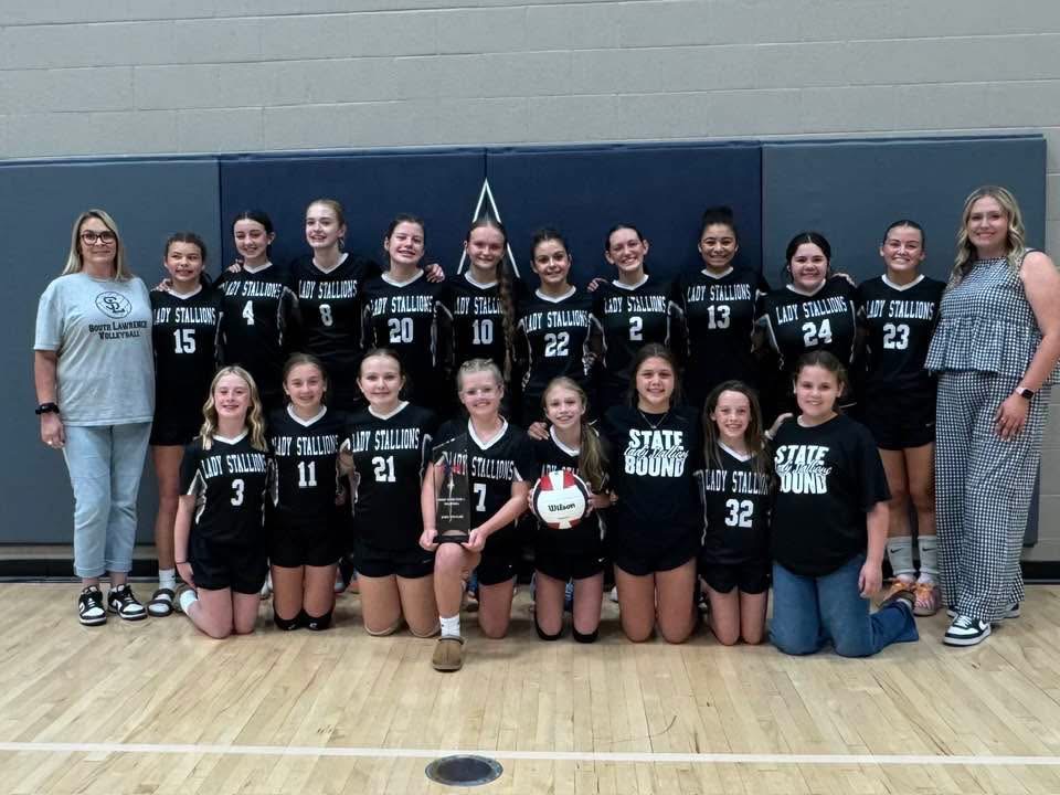 The Lady Stallions pose after winning their 5th place game.