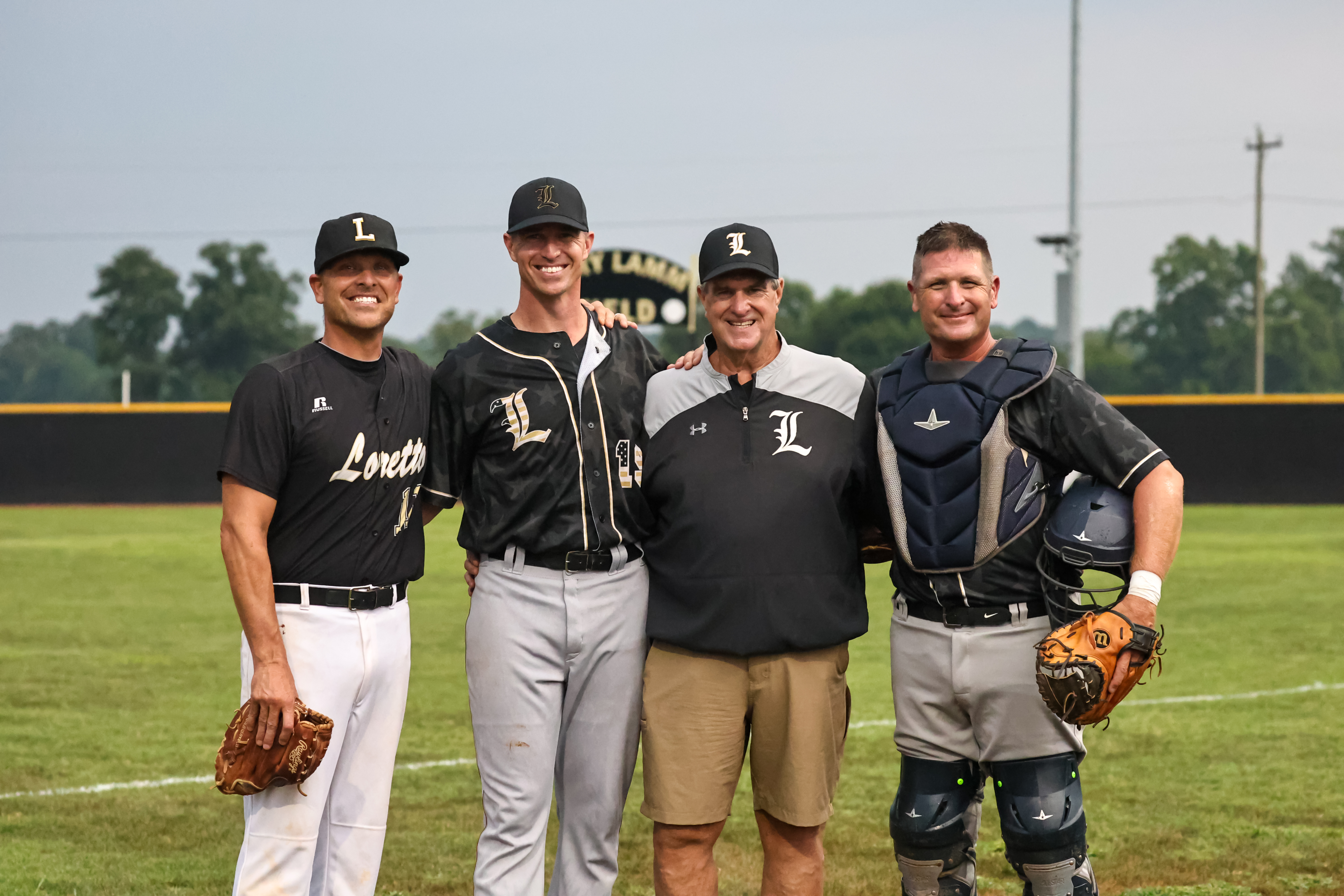 The Lamm family poses for a photo prior to the game.
