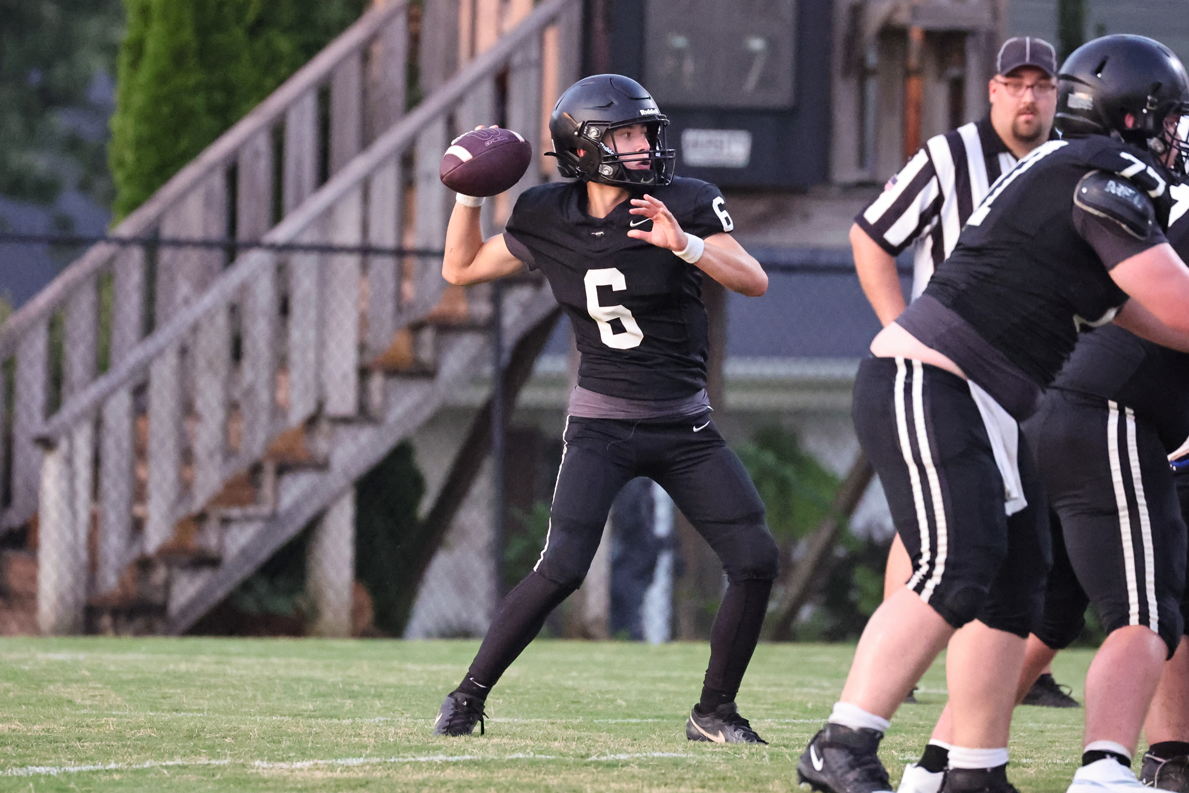 QB Vinny Veloz fires a pass.