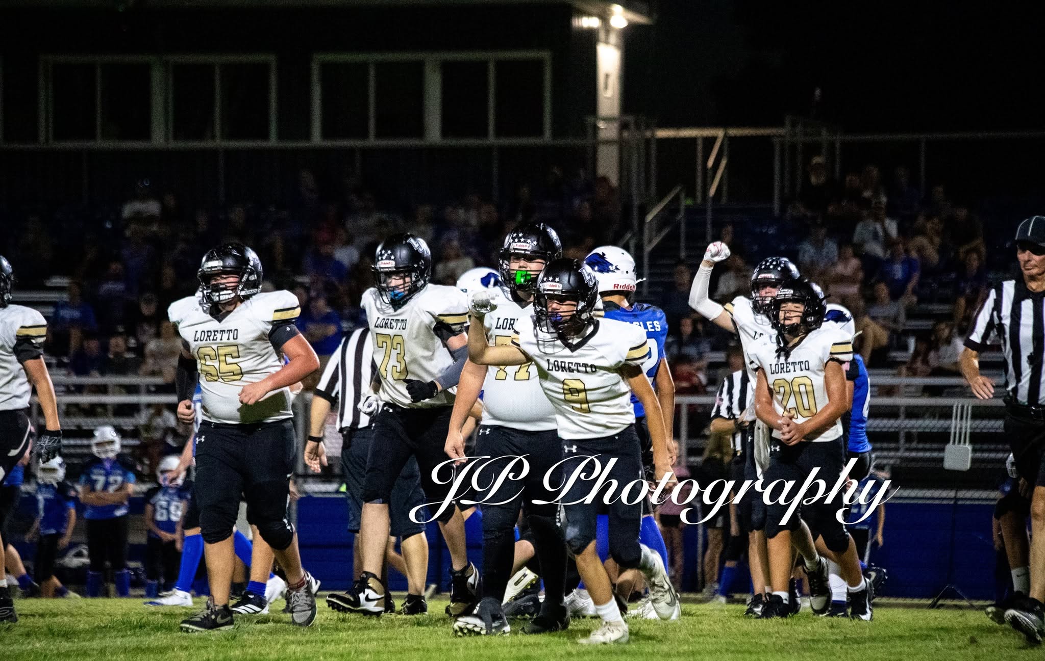 Members of the Junior High Mustangs celebrate after a big play